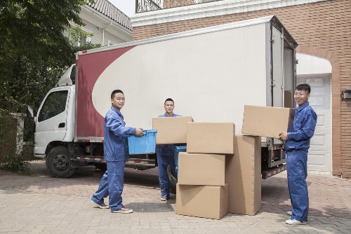 Removal van and moving boxes in Kentish Town street setting