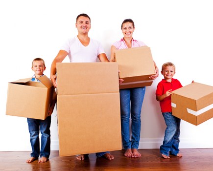 Packed boxes and furniture from a terrace house move