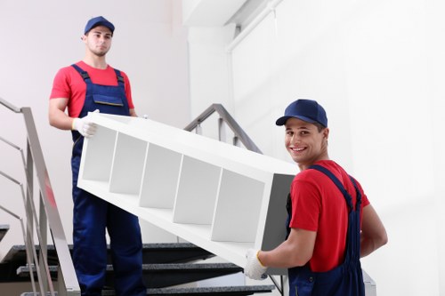 Removal van and moving boxes prepared for a Kentish Town house move