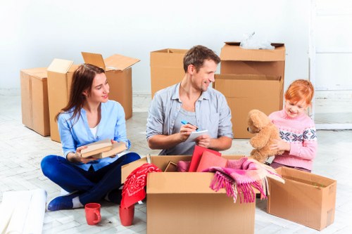 Local movers carrying items from a flat in Kentish Town