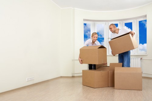 Furniture and boxes being loaded into a van for a Kentish Town removal