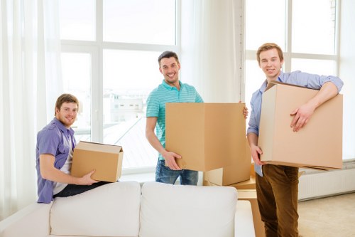 Local moving team handling furniture in Kentish Town