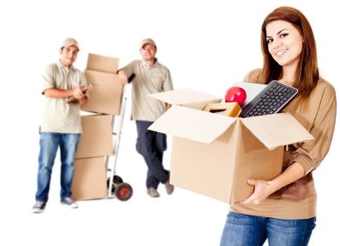 Furniture being carefully carried during a house removal