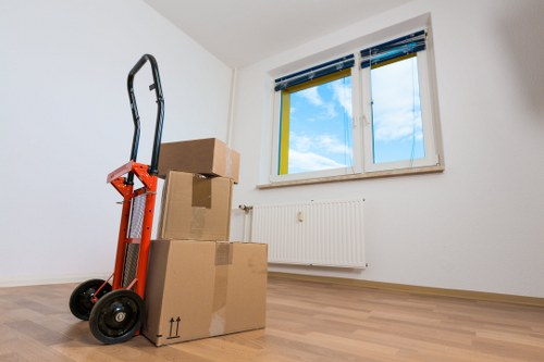 Packed office boxes and equipment ready for relocation