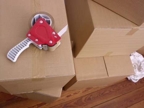 Packed boxes and furniture ready for local removal in Kentish Town