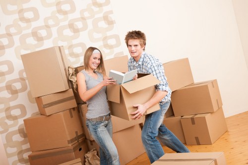Unpacking boxes into a newly moved-in Kentish Town flat