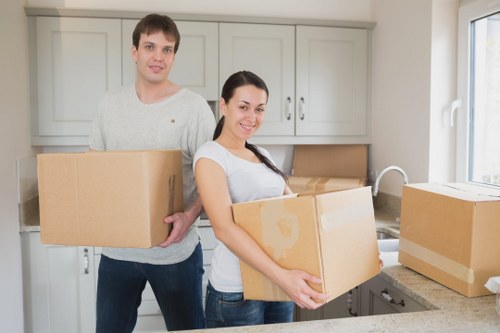 Loading boxes and bulky items into a van for a Kentish Town job